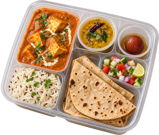 A veg bento — paneer curry, dal, jeera rice, roti, salad and a gulab jamun